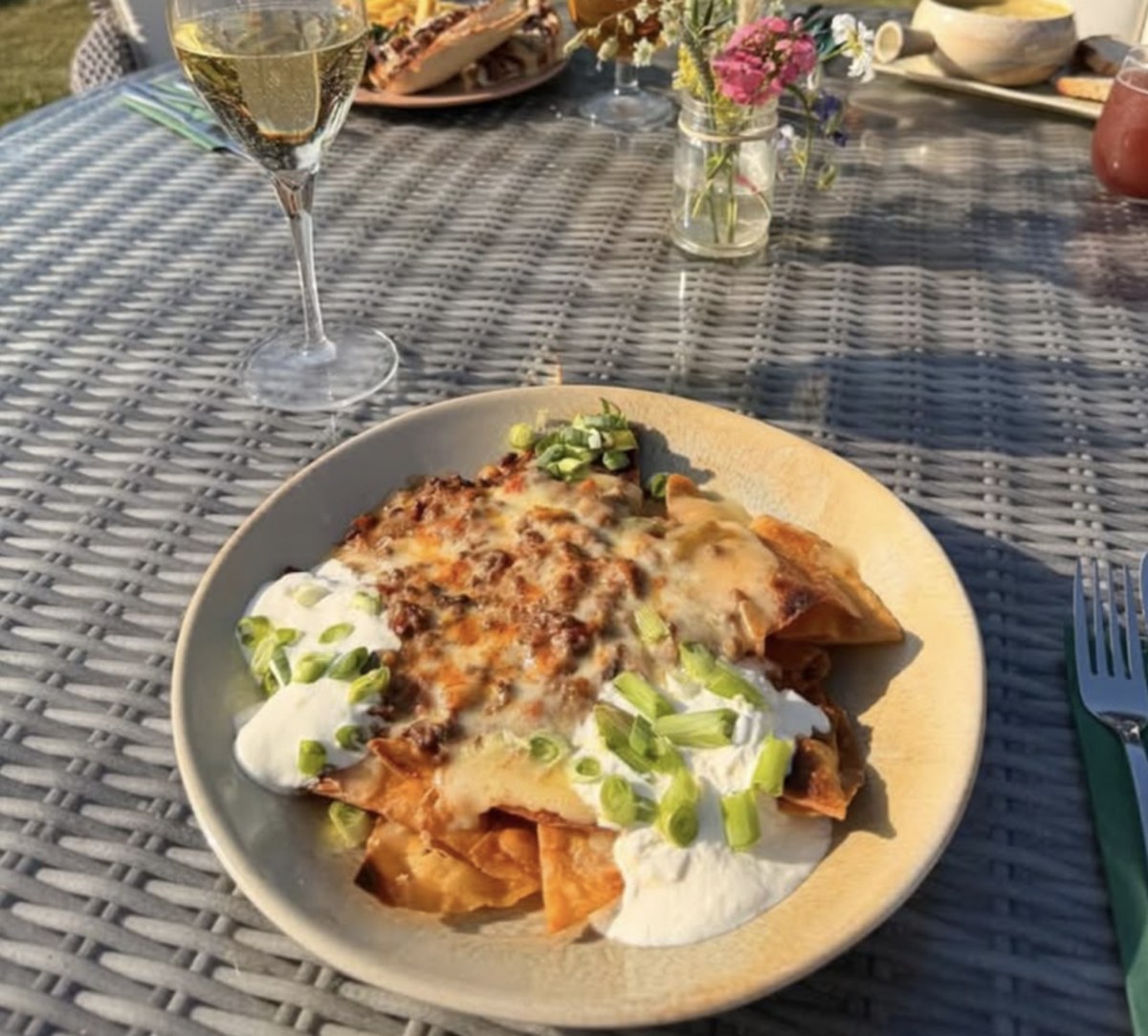 Loaded nachos served in the beer garden