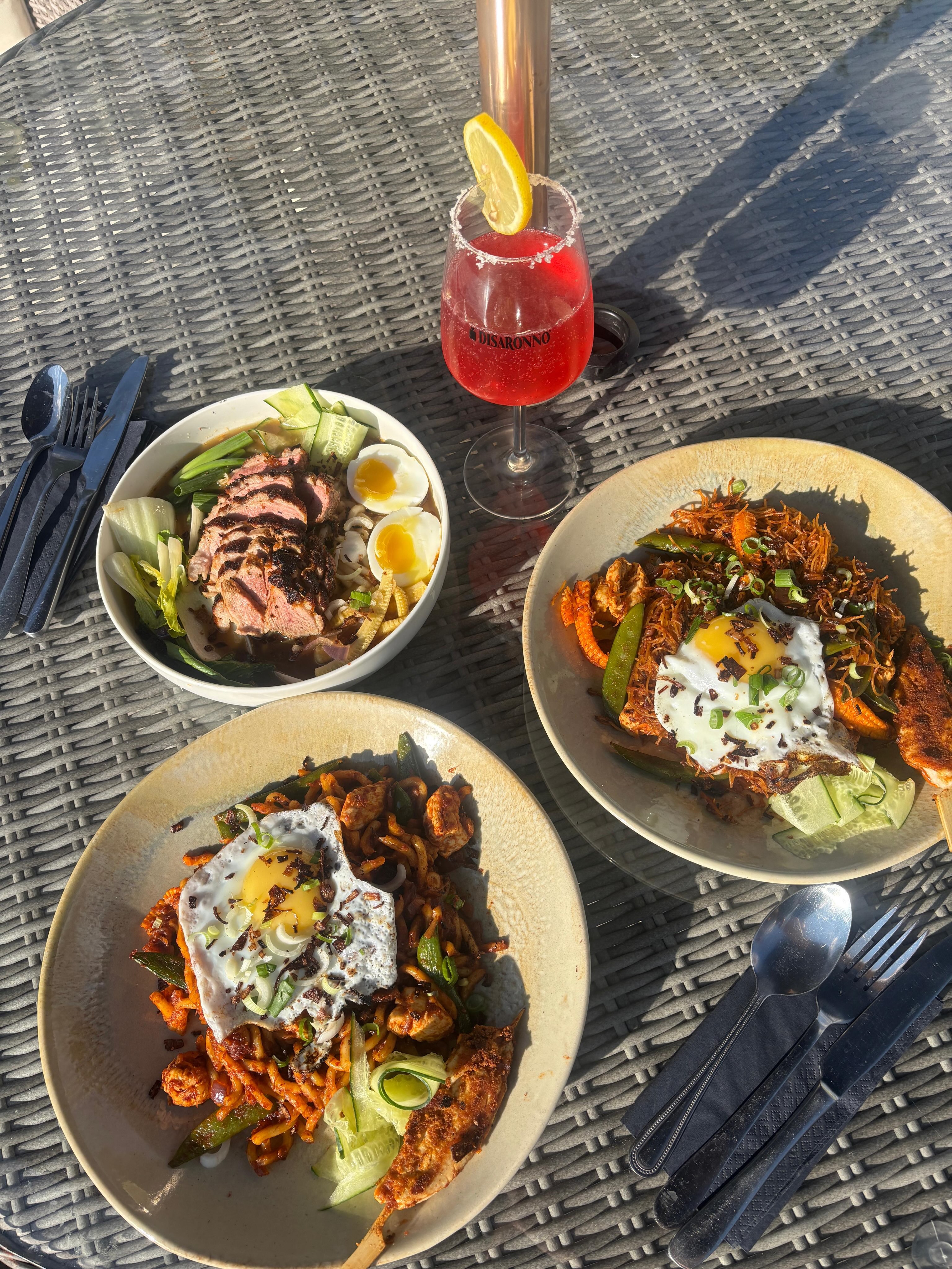Shakshuka brunch plates served in the garden